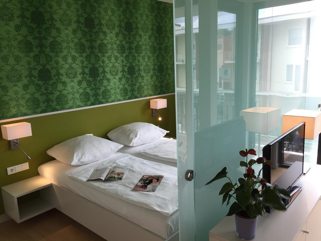 Carat Apartments Grömitz Quarto foto