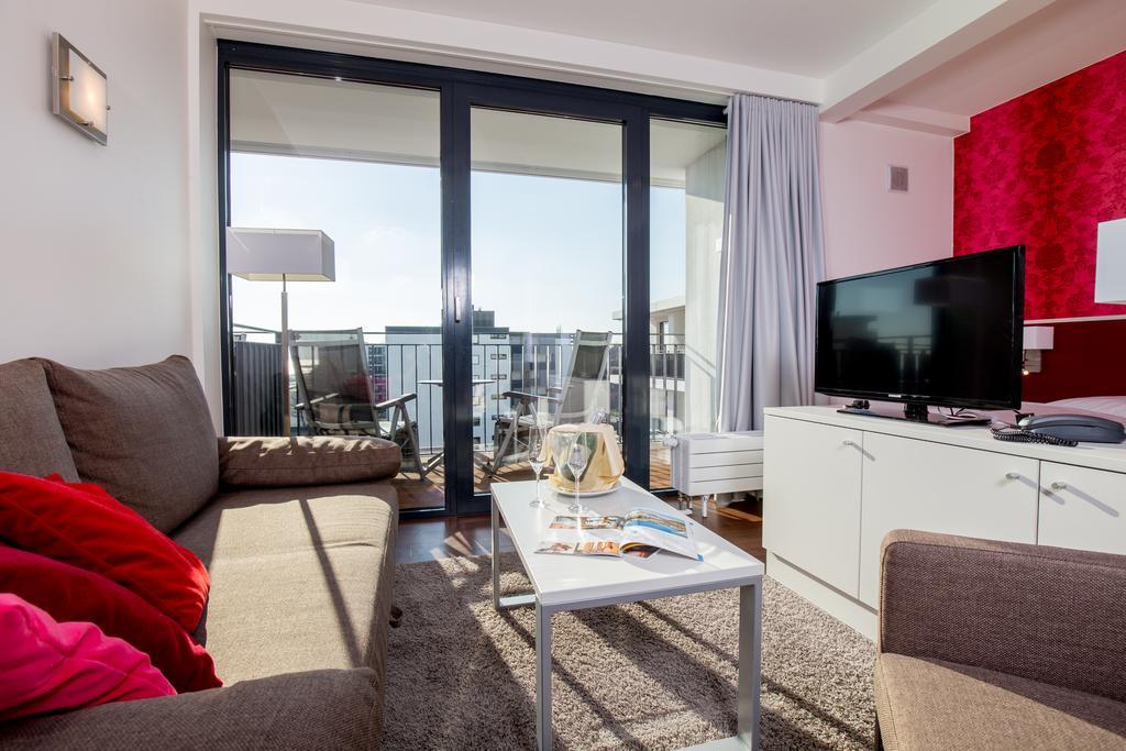 Carat Apartments Grömitz Quarto foto