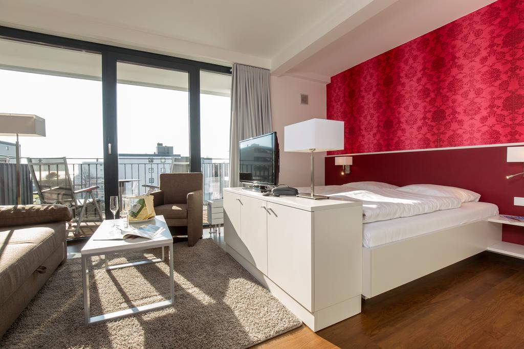 Carat Apartments Grömitz Quarto foto