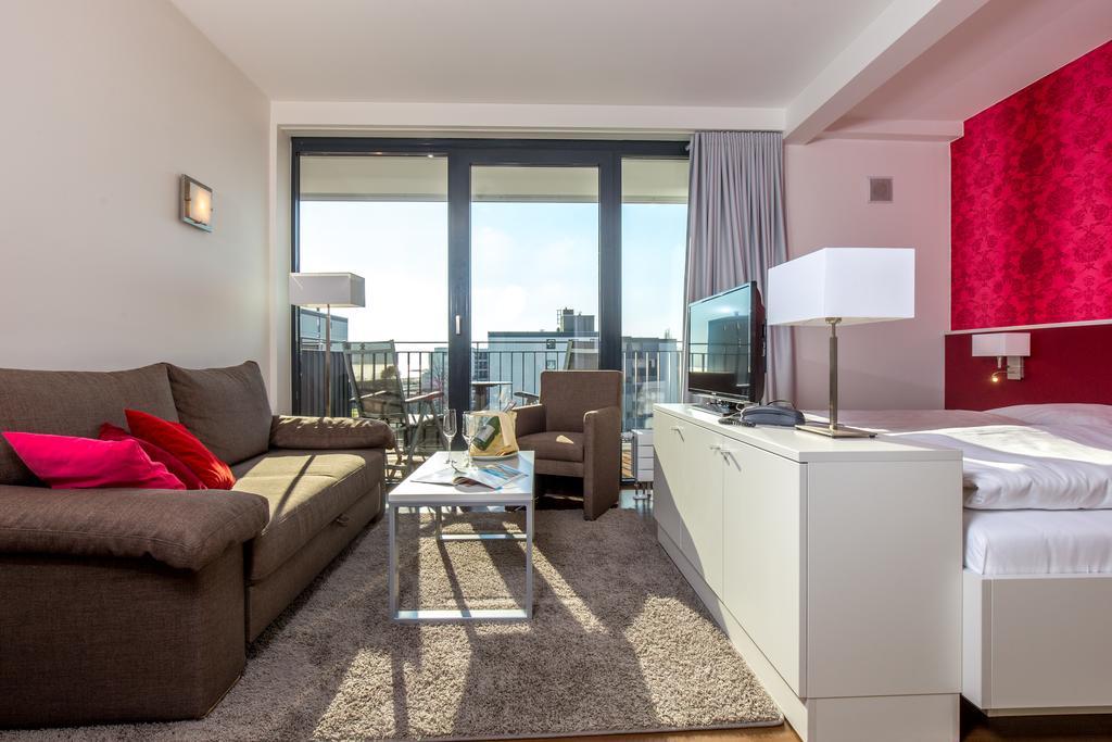 Carat Apartments Grömitz Quarto foto